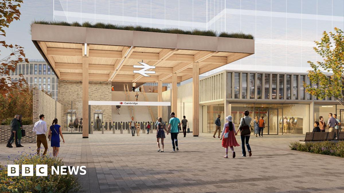 A CGI mock-up of a the proposed new entrance to Cambridge railway station. It is a brown timber construction.