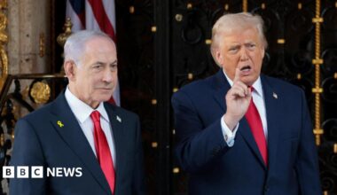 U.S. President Donald Trump speaks to the media next to Israeli Prime Minister Benjamin Netanyahu.