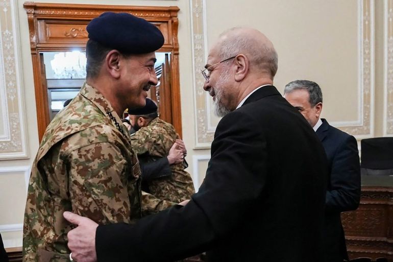 This handout photo taken and provided by the Office of Iranian Parliament Speaker on April 16, 2026 shows Iranian Parliament speaker Mohammad Bagher Ghalibaf (R) welcoming Pakistan's Army Chief Asim Munir before their meeting in Tehran.