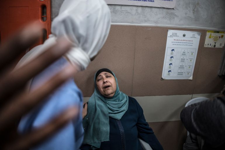 EDITORS NOTE: Graphic content / The parents of a man who was killed in alleged Israeli settler gunfire in the village of Al-Mughayyir, east of Ramallah in Israeli-occupied West Bank, mourn at a hospital in Ramallah on April 21, 2026.