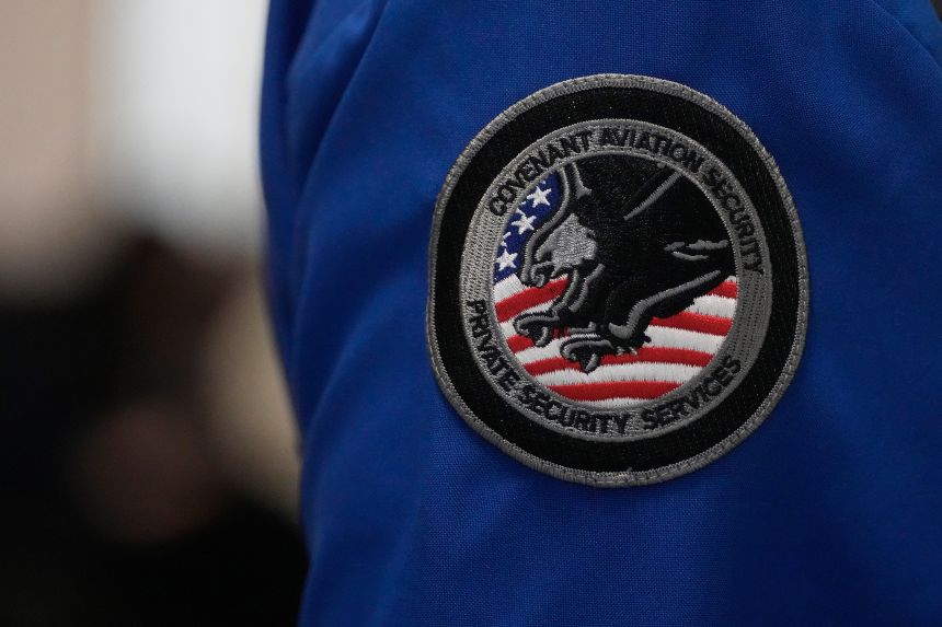 A Covenant Aviation Security Private Security Services patch is shown on an agent at San Francisco International Airport in San Francisco, February 27, 2026. (AP Photo/Jeff Chiu)