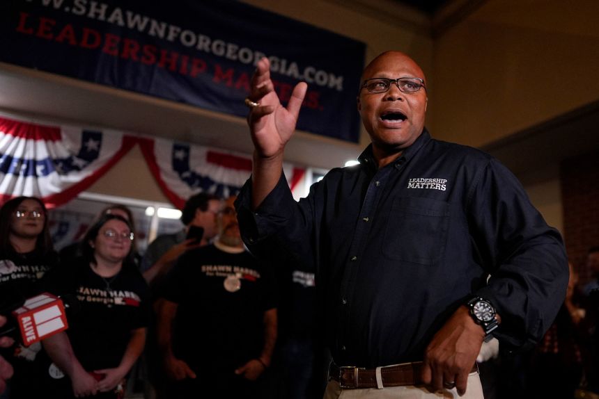 Shawn Harris speaks to supporters after learning he would advance to a runoff election, during an election night watch party in Rome, Georgia, on March 10.