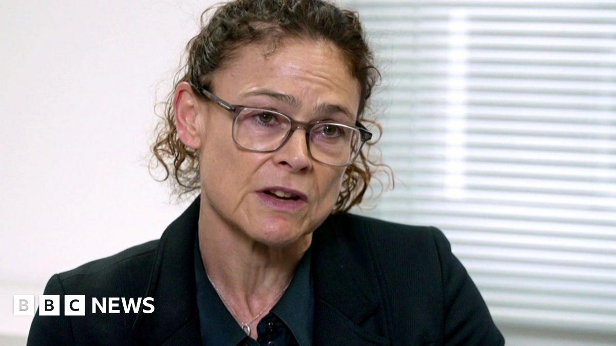 Kyran Smith mugshot. He has dark hair and dark stubble.