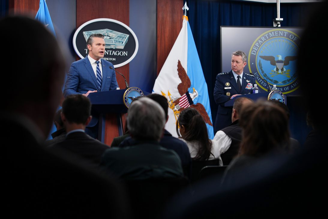 Secretary of War Pete Hegseth (left) speaks as Chairman of the Joint Chiefs of Staff Gen. Dan Caine looks on during a press briefing at the Pentagon on Wednesday in Arlington, Virginia.