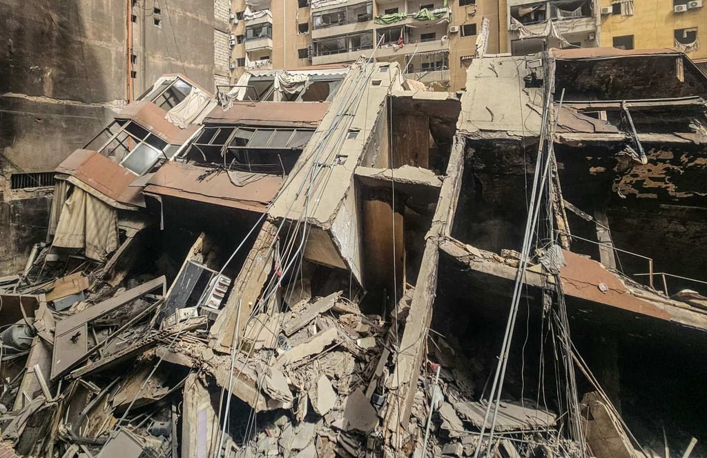 A building is destroyed by an overnight Israeli air strike in the Haret Hreik neighbourhood of Beirut’s southern suburbs on Thursday. Photo: AFP