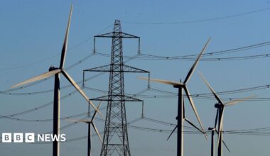 File photo dated 28/12/17 of a view of the Little Cheyne Court Wind Farm amongst existing electricity pylons on the Romney Marsh in Kent.