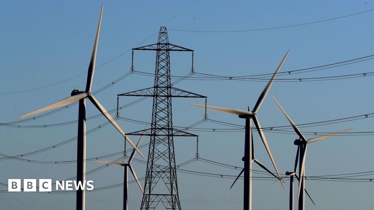 File photo dated 28/12/17 of a view of the Little Cheyne Court Wind Farm amongst existing electricity pylons on the Romney Marsh in Kent.
