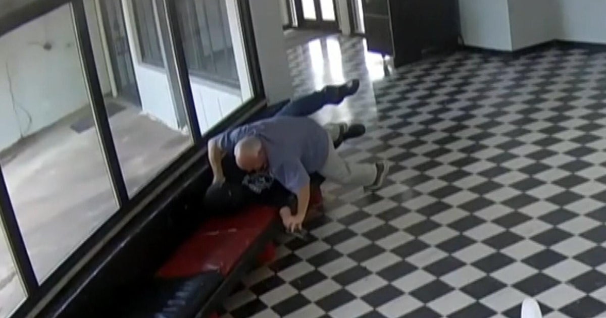 Newly released surveillance video shows Oklahoma high school principal tackling gunman