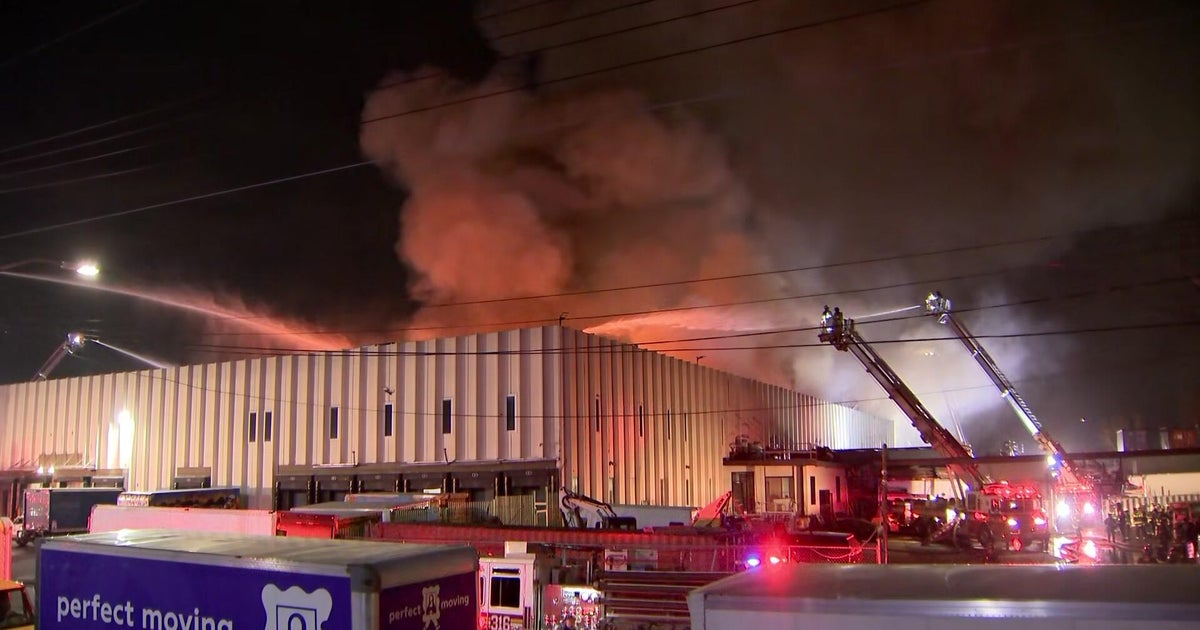 FDNY crews battle massive factory fire in Queens