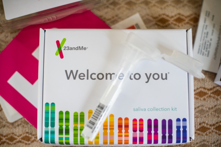 A partly opened 23andMe Ancestry home DNA kit sat on a tabletop.