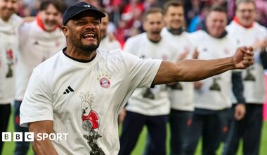 Bayern Munich players line up to celebrate winning the Bundesliga title