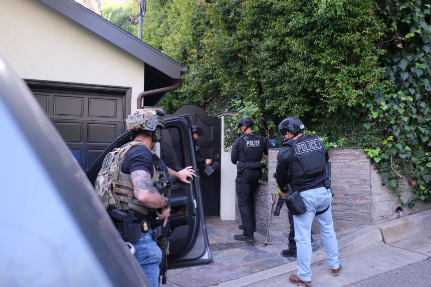 Photos posted by the Los Angeles Police Department show the operation that led to the arrest of singer d4vd – whose legal name is David Anthony Burke – on April 16 in the killing of a 14-year-old girl whose decomposed body was found in a car last year.