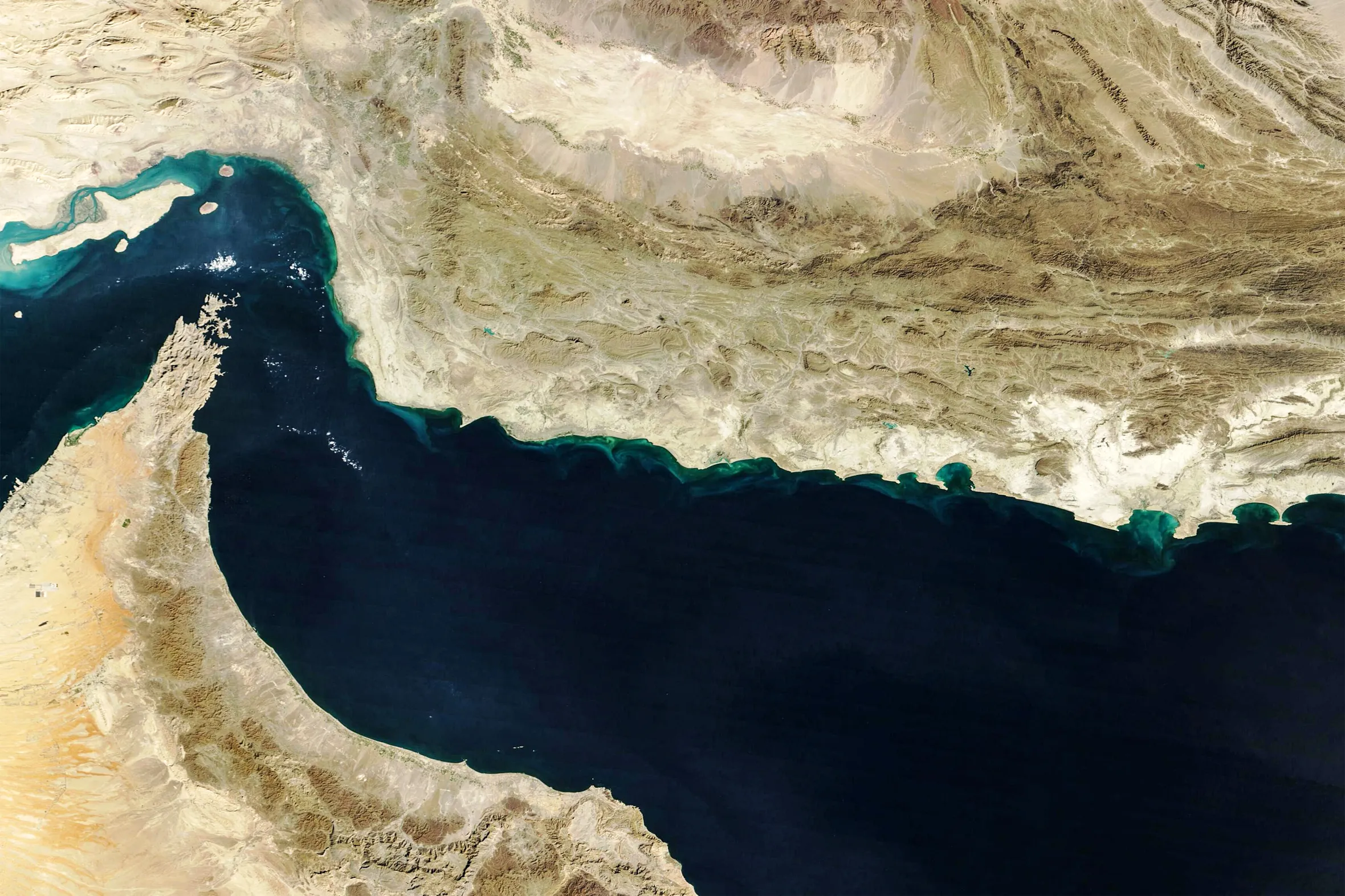 Satellite image showing the Gulf of Oman, Makran region, and Strait of Hormuz.