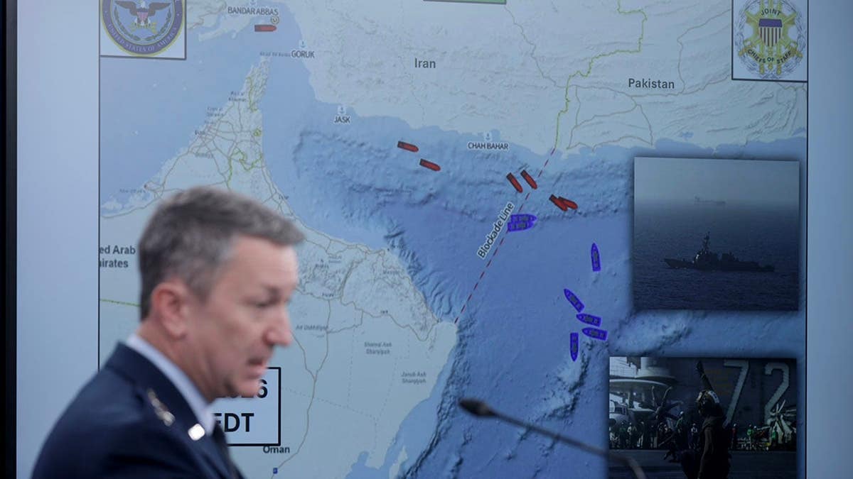 Gen. Dan Caine speaking and displaying a map at the Pentagon briefing