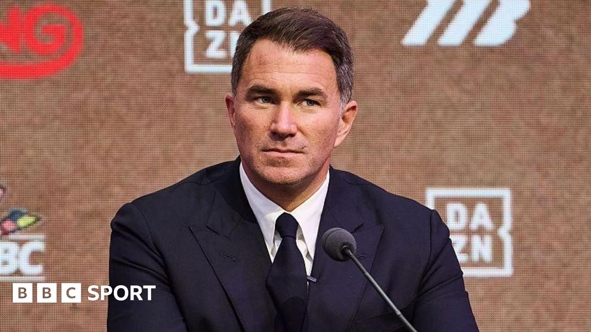 Eddie Hearn speaking at a news conference