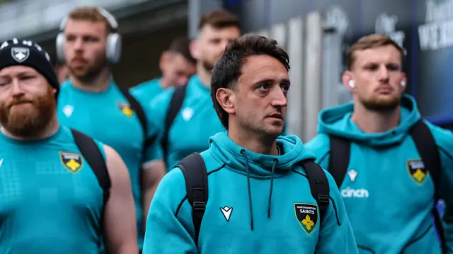 Alex Mitchell and team-mates arrive