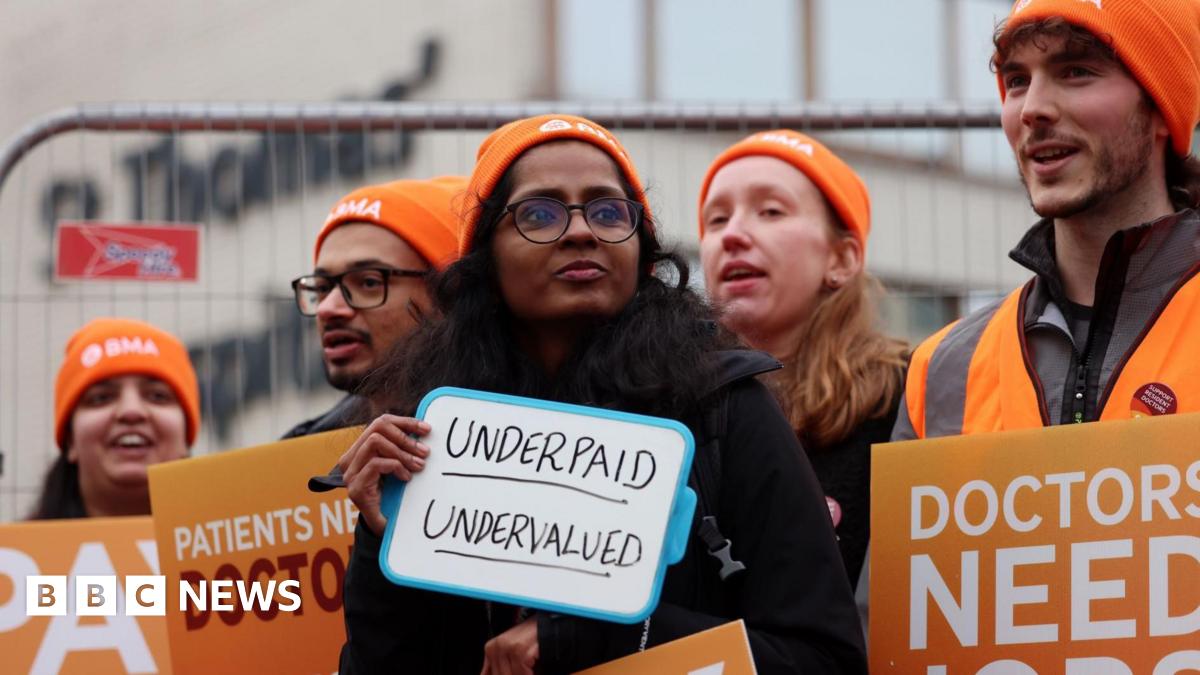 Striking resident doctors outside St Thomas' Hospital in London in December 2025