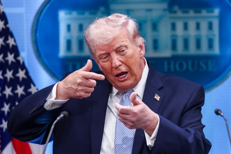 epaselect epa12872329 US President Donald Trump gestures as he responds to a question from the news media during a briefing on Iran from the White House in Washington, DC, USA, 06 April 2026. EPA/JIM LO SCALZO