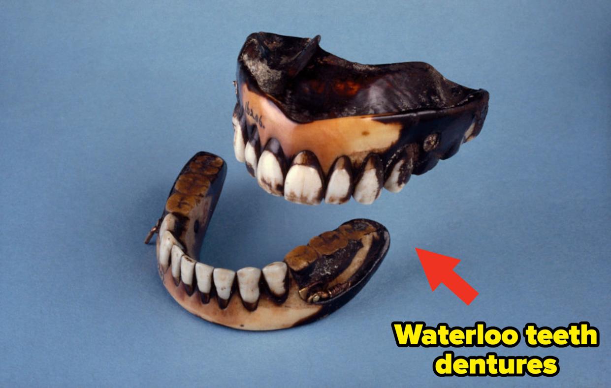 George Washington's dentures, made from ivory and other materials, displayed against a plain background