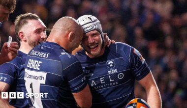 Fitz Harding (right) is congratulated by Bristol Bears team-mates after scoring a try