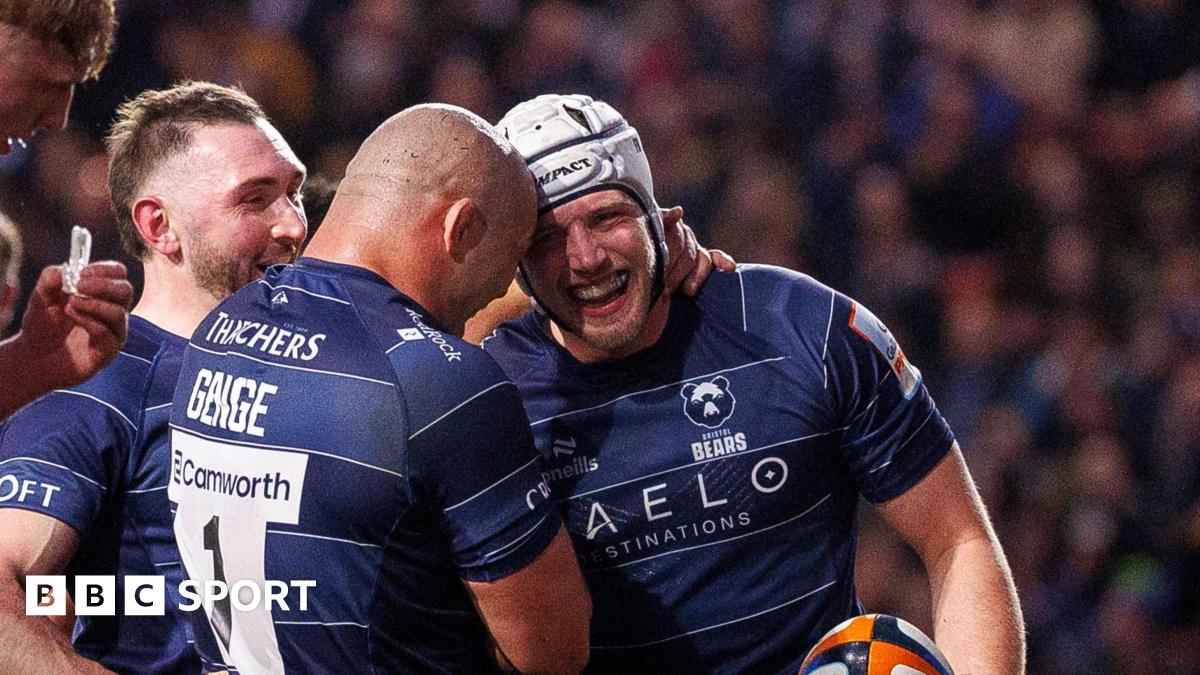 Fitz Harding (right) is congratulated by Bristol Bears team-mates after scoring a try