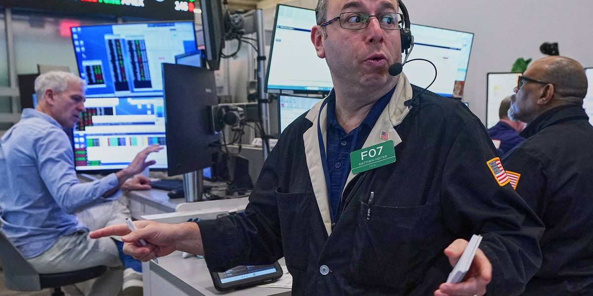 Asian shares are mixed and oil gains more than $1 as Iran talks remain in flux