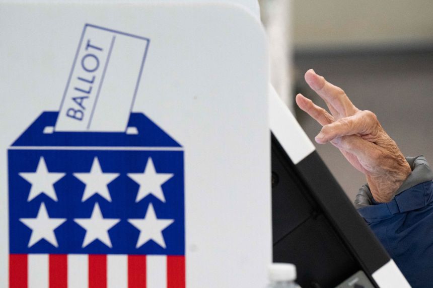 A person votes at a polling station in Black Mountain, North Carolina, on October 18, 2024.