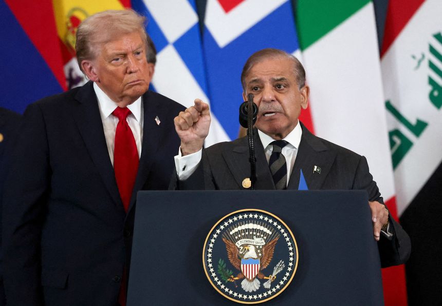 Pakistani Prime Minister Shehbaz Sharif speaks as US President Donald Trump listens in Sharm El-Sheikh on October 13, 2025.