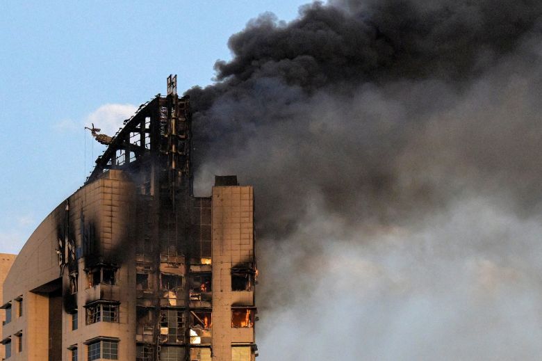 Smoke rises from a high-rise building following an Iranian drone attack in Kuwait City on March 8.