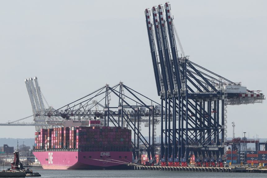A cargo ship loaded with shipping containers is seen at Port Jersey container terminal in Jersey City, New Jersey.