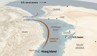A man walks down a sidewalk in front of a concrete wall displaying a painted mural for the 2026 World Cup in Mexico.