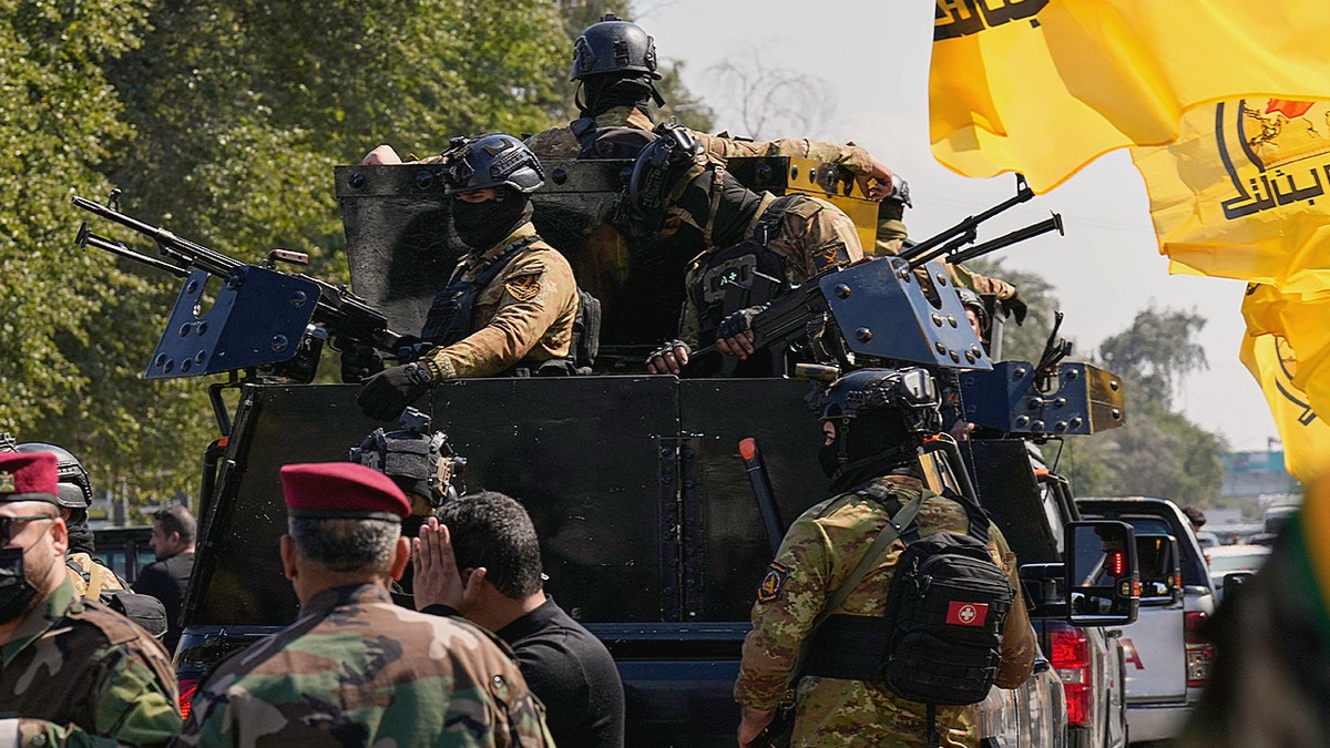 Hezbollah militants launching long-range missiles from Lebanon toward northern Israel