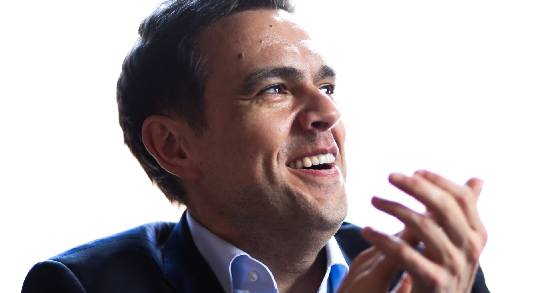 Charles Milliard, leader of the Liberal Party of Quebec, claps his hands.