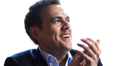 Charles Milliard, leader of the Liberal Party of Quebec, claps his hands.