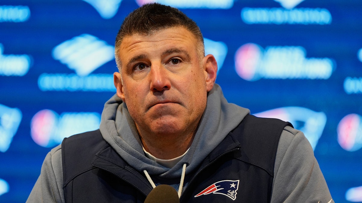 New England Patriots head coach Mike Vrabel speaking at a news conference