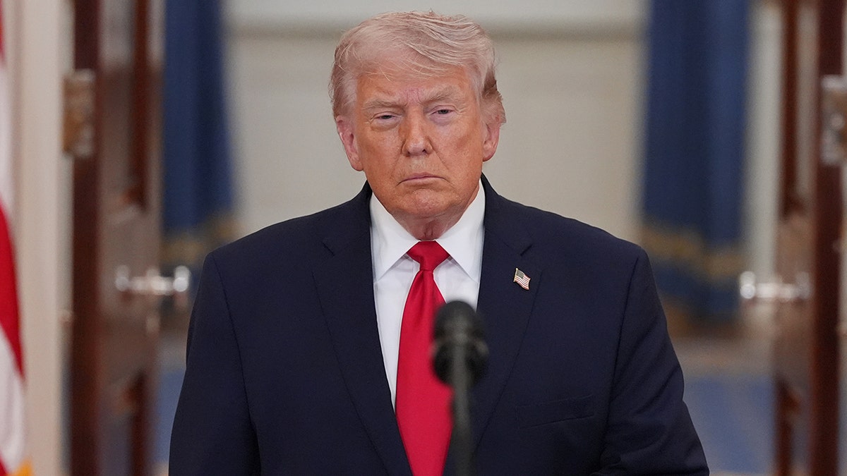 President Donald Trump speaking in the Cross Hall of the White House