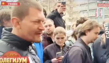 A photo of a demonstrator speaking on television.