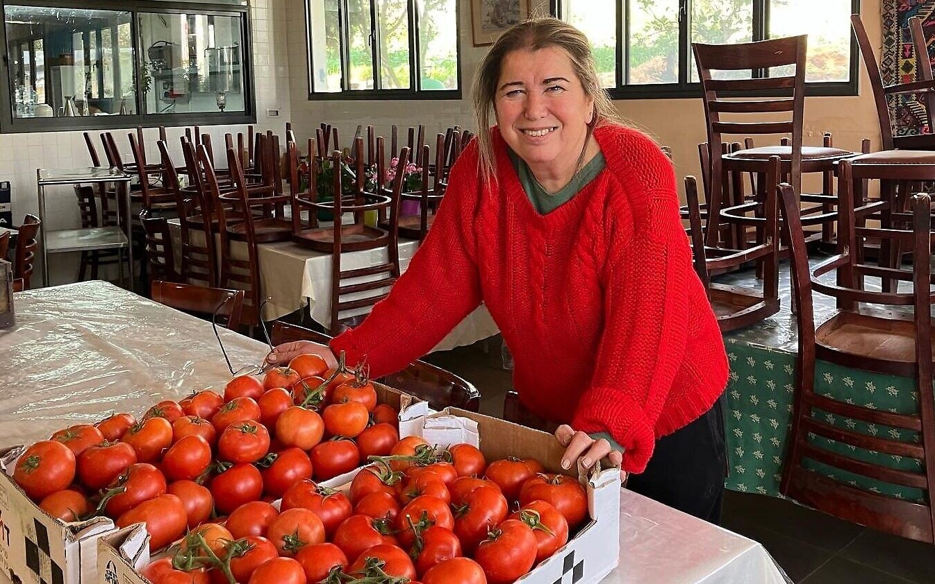 Ora Hatan, one of the honorary torchlighters at the state’s annual Independence Day ceremony on Mount Herzl in Jerusalem on April 21, 2026, stands in her new restaurant in her house in Shtula on April 13, 2026. (Diana Bletter/Times of Israel)