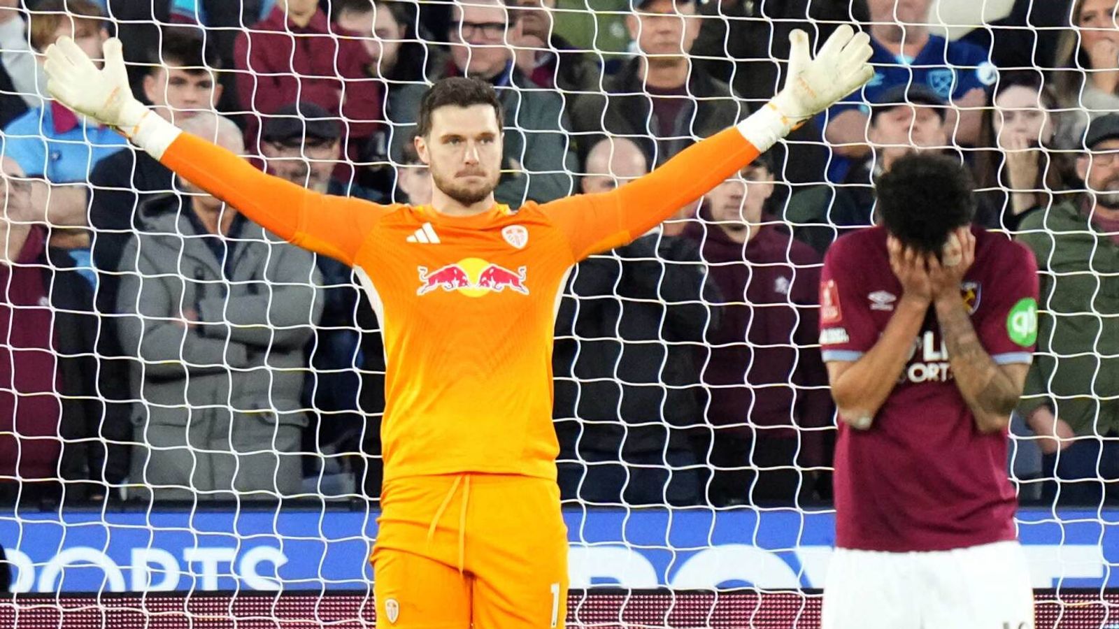 Lucas Perri celebrates after saving Pablo's penalty