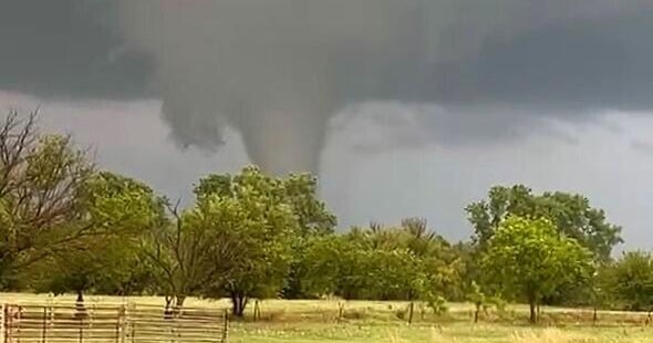 Tornado roars through Enid, Oklahoma, destroys homes, forces Air Force base to close