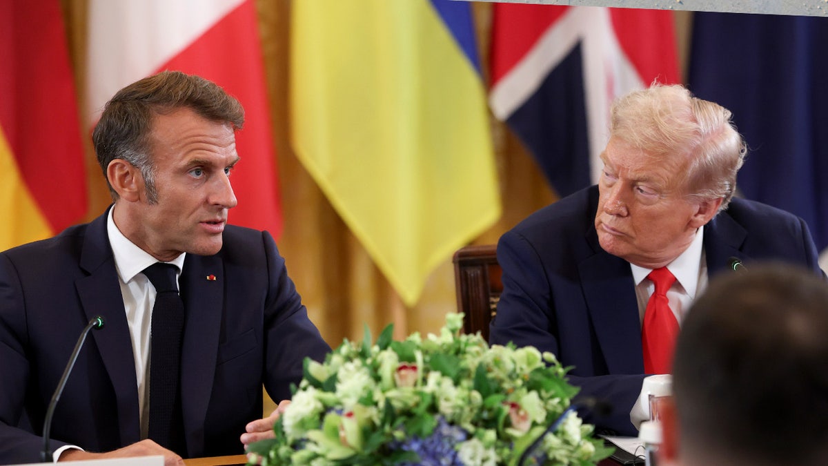 President Donald Trump speaking with French President Emmanuel Macron during a meeting at the White House