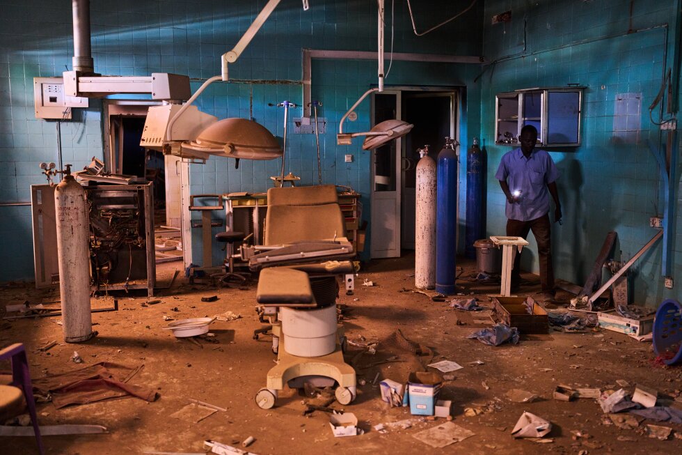 A surgeon keeps a bombed hospital running during Sudan's war