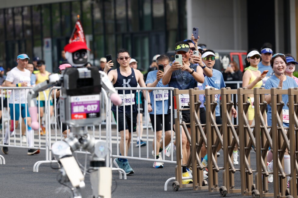 A humanoid robot beats the human half-marathon world record in Beijing