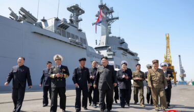 North Korea's Kim Jong Un oversees missile tests from new warship