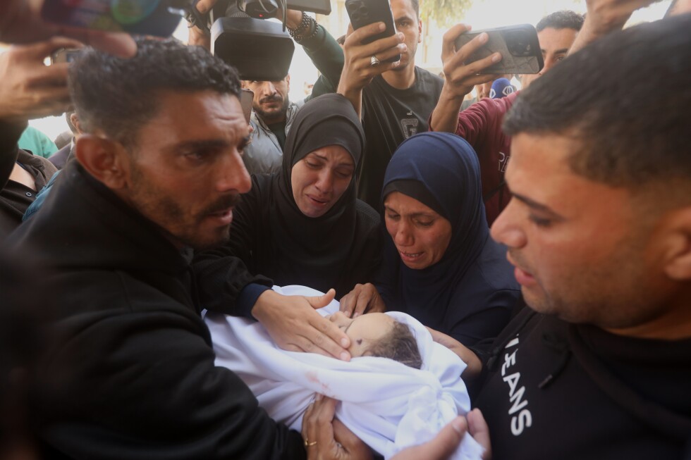Gaza mourns pregnant woman and children killed in Israeli strikes