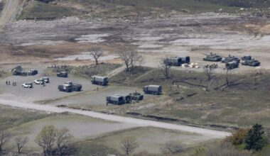 A shell blast inside a gun turret on a tank kills 3 at an army drill in Japan