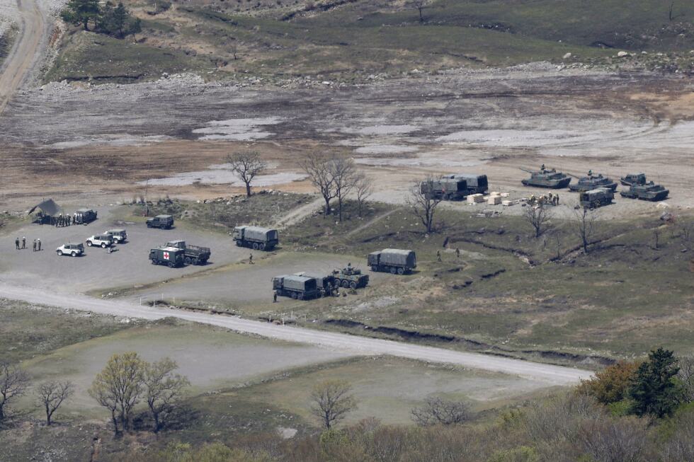 A shell blast inside a gun turret on a tank kills 3 at an army drill in Japan