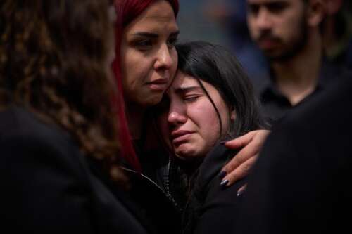 The Latest: US and Israel strike Iran's oil, rail and bridges ahead of Trump deadline