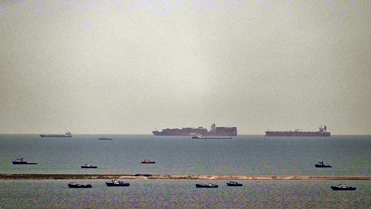 Fishing boats and cargo ships sailing in the Arabian Gulf near the United Arab Emirates