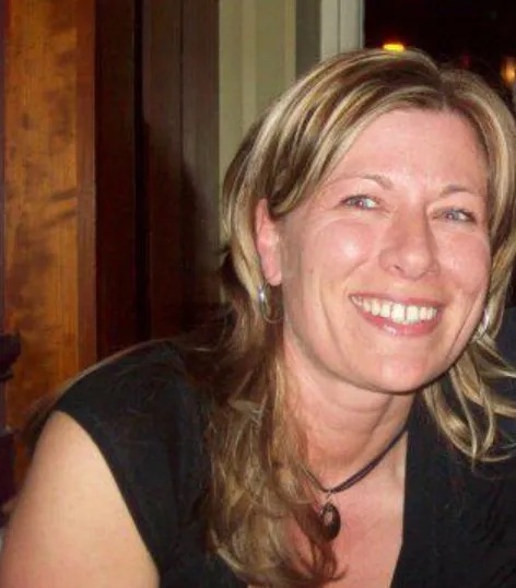 Wendy Duffy smiling and looking at the camera.